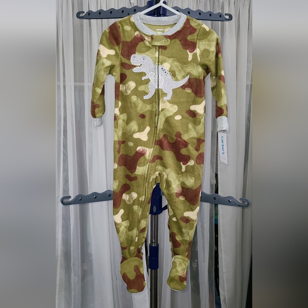 NEW. Carters footy pj's. Size 18 month.